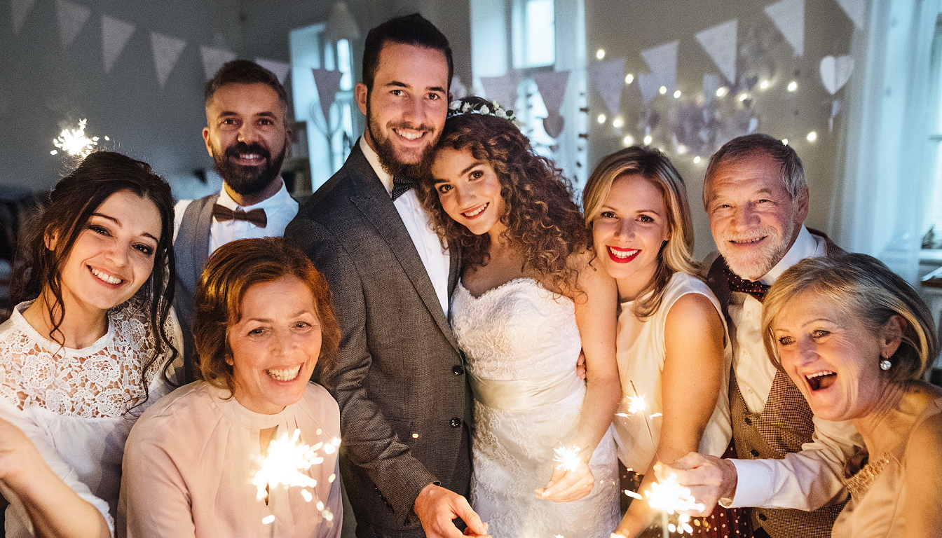 A picture of a happy wedding party.